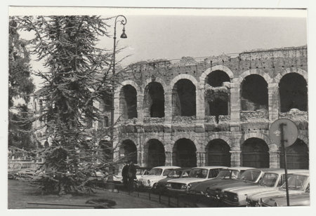 ROME, ITALY - CIRCA 1970s: Vintage photo shows the Coloseum - historical monument in Roma. Retro black and white photography. Circa 1970s.のeditorial素材