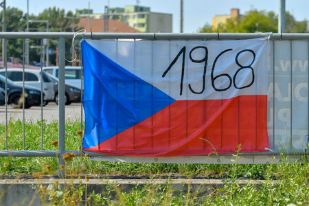 View of the Czech flag displayed on the railing. The flag shows the year 1968.