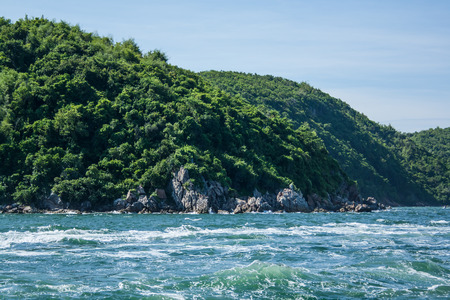 Summer photo of the sea, ocean and islands in the background. Tropical island. Vacations recreation in the summer.の写真素材