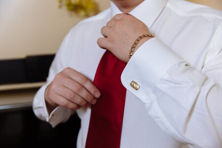 Business man hands with cufflinks. man clotherの写真素材