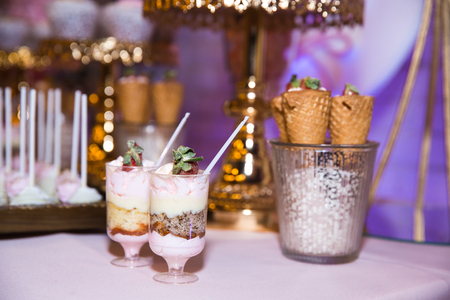 Candy bar. Table with sweets, candies dessertsの写真素材