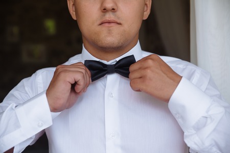 Elegant gentleman clother. shirt and bow tieの写真素材