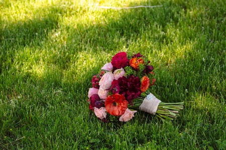 wedding bouquet on green backgroundの写真素材