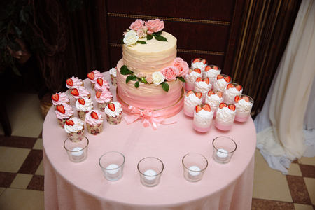 Candy bar. Table with sweets, candies dessertsの写真素材