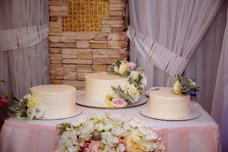 Sweets multilevel wedding cake decorated with flowersの写真素材