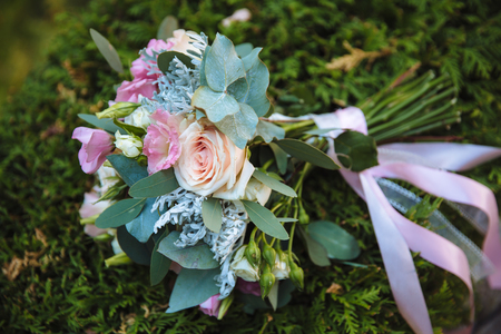 Wedding bouquet on background of green grass.の写真素材