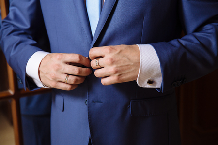 Business man hands with cufflinks. Elegant gentleman clotherの写真素材