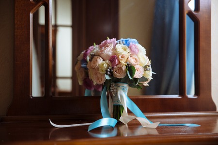 wedding bouquet on Brown table.の写真素材