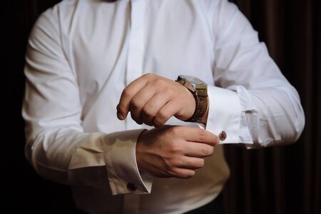Business man hands with cufflinks. Elegant gentleman clotherの写真素材
