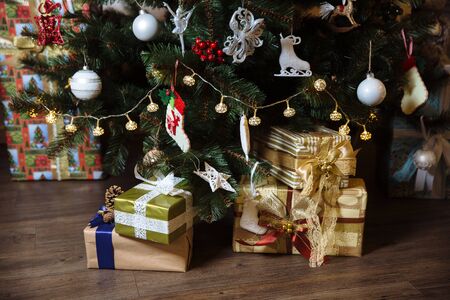 Presents, gift under the Happy New Year and Christmas tree.の写真素材