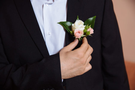 Groom's jacket with bouttonniere flowersの写真素材