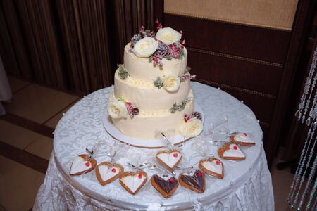Sweets multilevel wedding cake decorated with flowersの写真素材