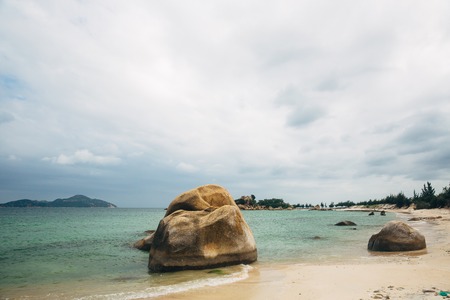 Beautiful landscape with view of ocean, perfect beach, big stones, trees, azure water. Background image. Concept  travelの写真素材