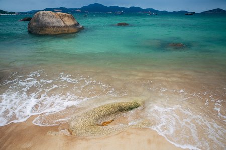 Beautiful landscape with view of ocean, perfect beach, big stones, trees, azure water. Background image. Concept  travelの写真素材