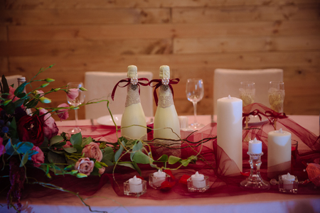 Beautiful decorated wedding restaurant for marriage. Colorful decoration for celebration. Beauty bridal interior. Concept of style of banquet hallの写真素材