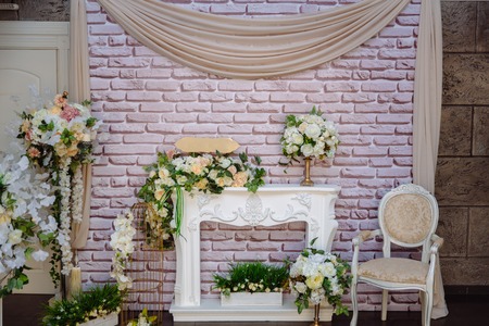 Beautiful decorated wedding restaurant for marriage. Colorful decoration for celebration. Beauty bridal interior. Concept of style of banquet hallの写真素材