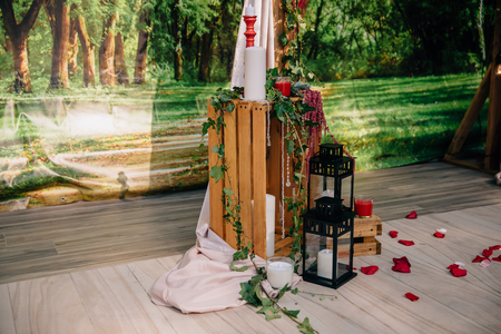 Part of Wedding ceremony arch, altar decorated with flowers on the lawnの写真素材