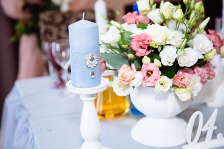 Beautiful decorated wedding restaurant for marriage. Colorful decoration for celebration. Beauty bridal interior. Concept of style of banquet hallの写真素材