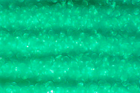 Defocus light. Glitter green soft light focus.の写真素材
