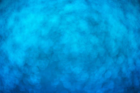 abstract blue bokeh background. Defocus light glitter.の写真素材