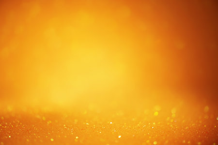 Glitter orange and yellow focal and defocus parts. Soft focus background.の写真素材