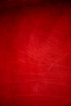 Velvet texture of seamless wine leather. Dark red matte background of suede fabric, closeup.の写真素材