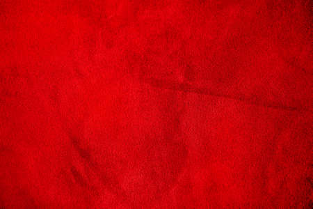 Velvet red texture. Red suede leather as background.の写真素材