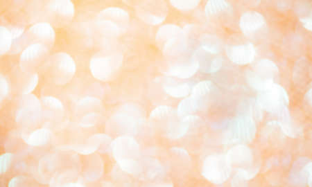 Round shape defocus lights are beige and white. Blurred bokeh. Material for the designer.の写真素材