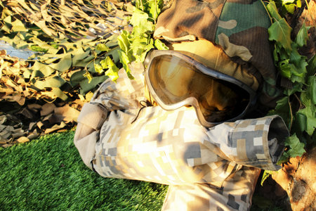 military camouflage uniforms with helmet and glasses