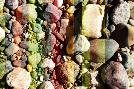 pebble and seaside stones in the sunny bright day on the beach, tinted for design and background