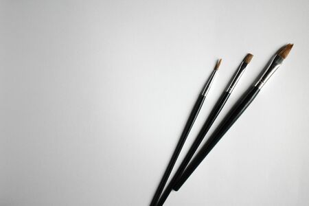 Paint brushes with blank  paper for drawingの写真素材