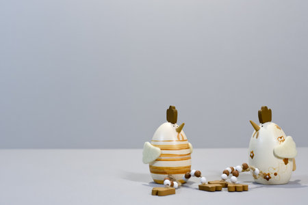 two toy chicken in the form of Easter eggs, funny handmade holiday figurines for childrens and home decorationの写真素材