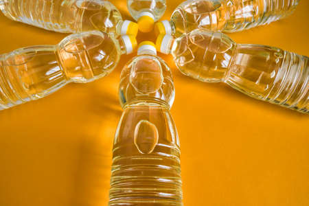 Top view of bottles with natural refined sunflower oilの写真素材