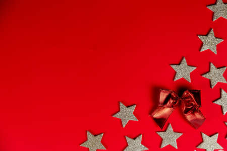 Christmas holidays composition on red background with copy space for your text, Flatlay on red backgroundの写真素材