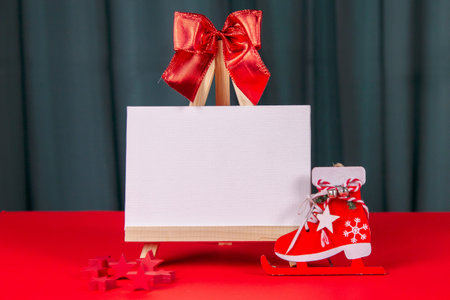 Photo of a wooden calendar on a red background, christmas, wooden toys, place for text
