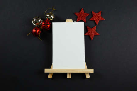 Christmas background concept. red stars on black background, christmas decor, flatlay.の写真素材