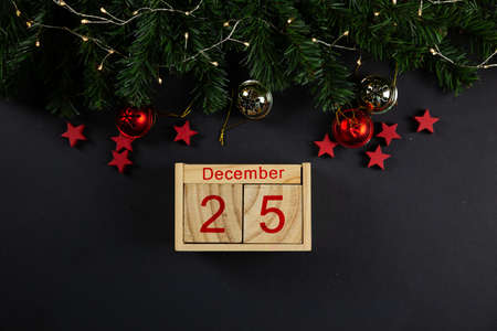 Christmas background concept. red stars on black background, christmas decor, flatlay.の写真素材