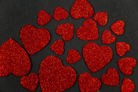 Red hearts on pink background, valentine's day, love backgroundの写真素材