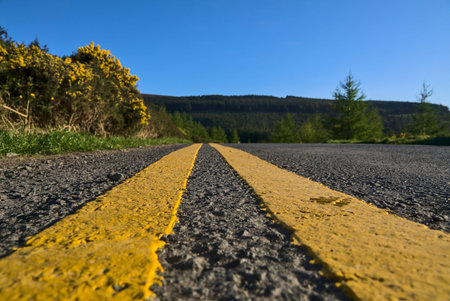 Empty Ticknock car park during the COVID-19 lockdown, Dublin, Ireland. Yellow leading lines