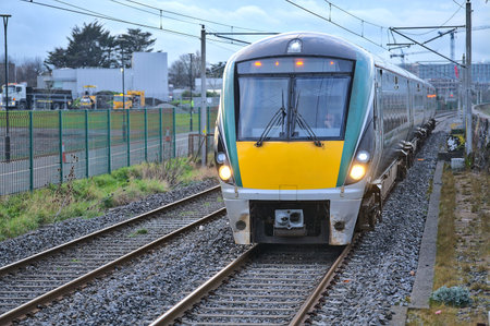 Dublin, Ireland - March 14, 2021: Beautiful closeup evening view of intercity train in action seen...