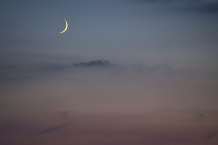Beautiful evening view of crescent Moon and Venus seen from Ticknock Forest National Park, County...