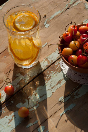 Lemonade and Cherries in summer evening sunlight.