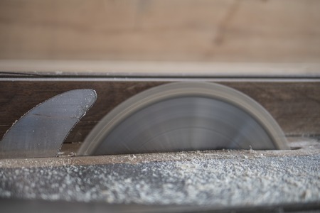 circular in action. table saw rotates saw bladeの写真素材