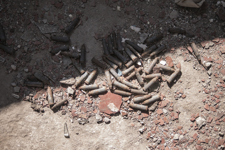 cartridges on the ground, the echo of warの写真素材
