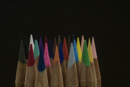 sharp colored pencils on a black background. copy spaceの写真素材