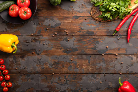 texture, wooden background with spices and vegetables top viewの写真素材