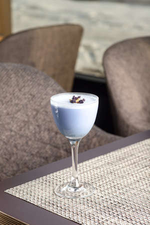 cocktail glass on the table, blue cocktail.の写真素材