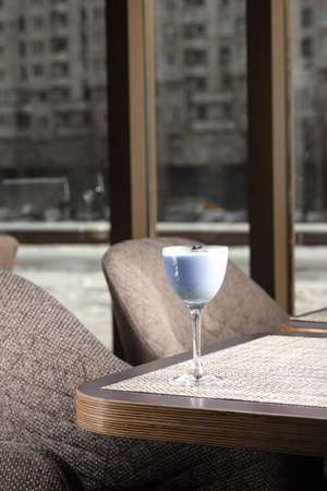 cocktail glass on the table, blue cocktail.の写真素材