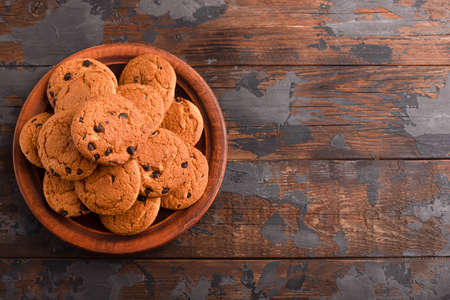 Cookies, cookies on different backgrounds, oatmeal cookies with chocolate.の写真素材