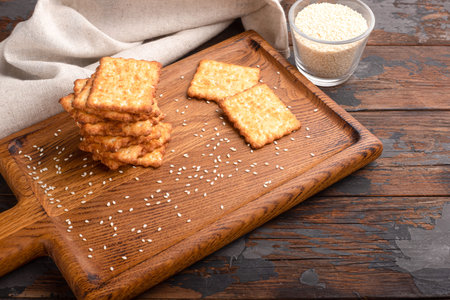 Sesame cracker, cracker, cookie cracker on different backgrounds.